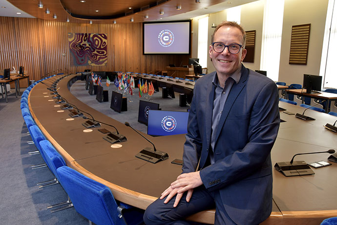 Florian Pappenberger sat in the ECMWF Council Chamber