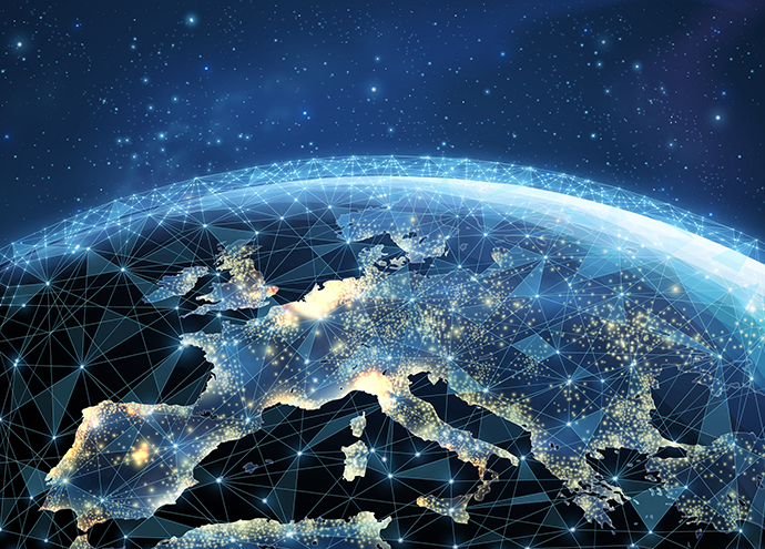 Digital illustration of Earth showing Europe at night, overlaid with glowing network connections across the continent.