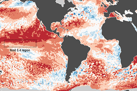 Map of world with countries in grey and oceans in red and blue with the El Nino 3.4 region in a box