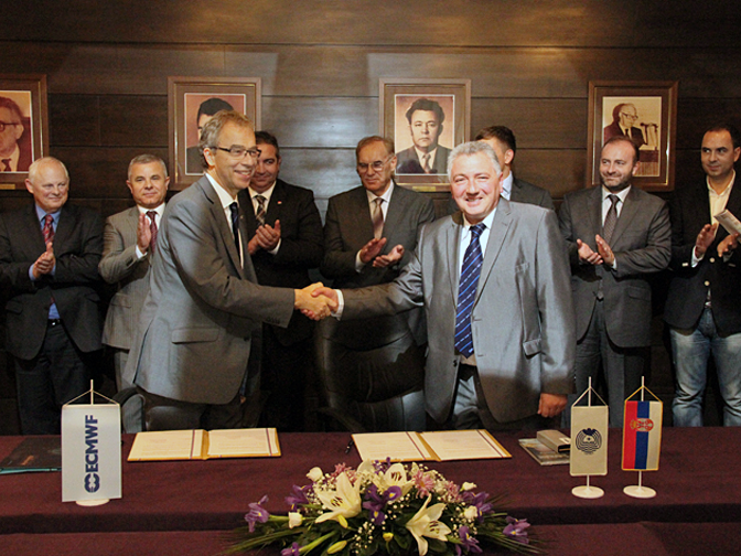 Signing of Accession Agreement with Serbia Photo of accession agreement being signed between Serbia and ECMWF