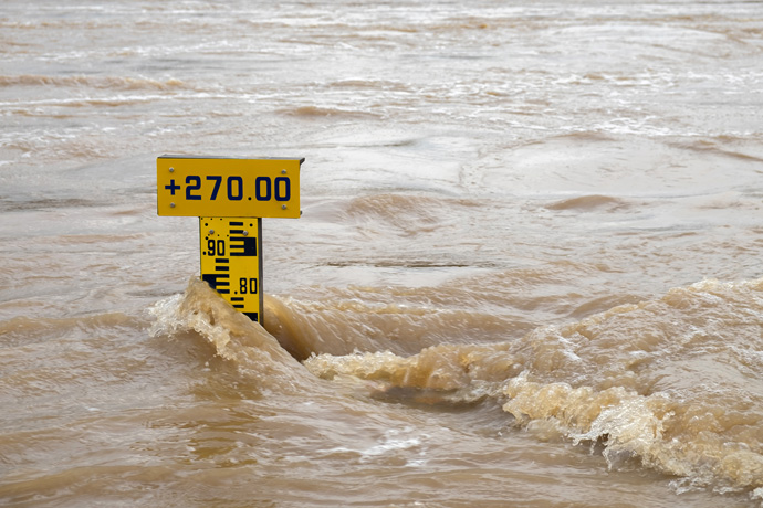 River level gauge in fast-flowing current River level gauge in fast-flowing current
