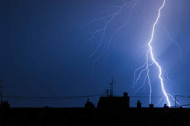 Lightning over urban skyline