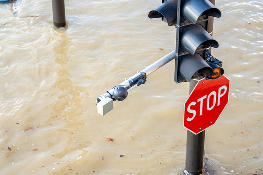 A submerged traffic light and Stop sign in flooded Budapest after the Danube rises following storm 'Boris'
