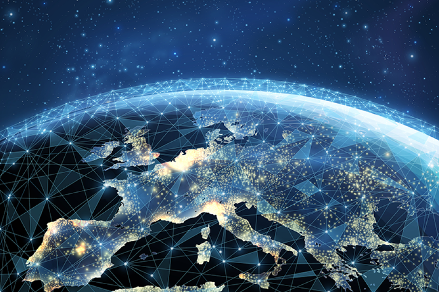 Digital illustration of Earth showing Europe at night, overlaid with glowing network connections across the continent.