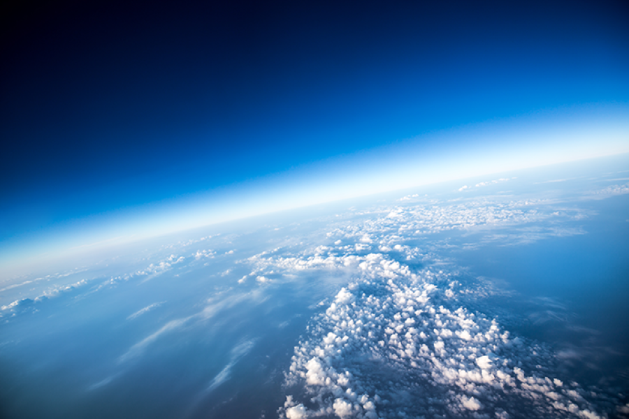 View of Earth’s atmosphere and cloud formations from high altitude