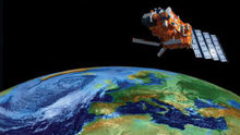 Satellite in outer space with Planet Earth on background