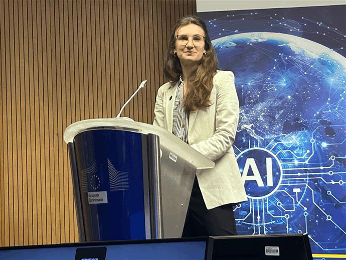 Sara Hahner behind a lectern 