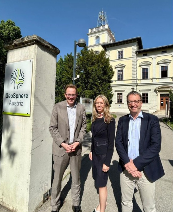 Florian Pappenberger stood with two people outside of GeoSphere Austria